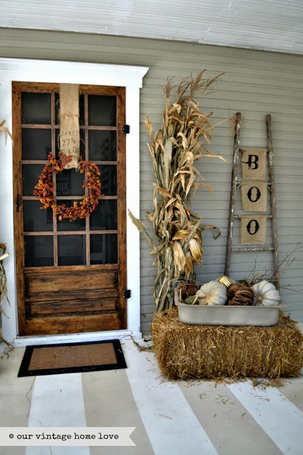 10 Fall Front Porch Decorating Ideas by A Blissful Nest - This front porch fall decor is so simple but still gives the perfect amount of rustic, fall feel without feeling overwhelming. 