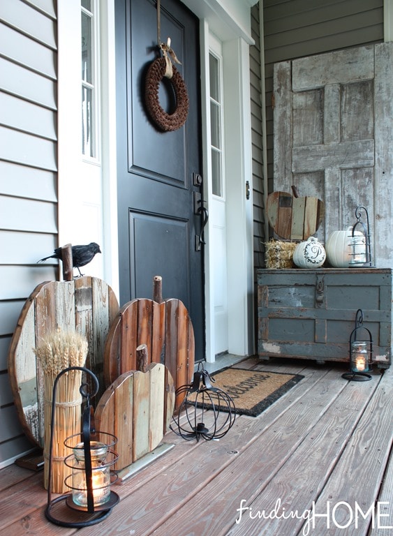 10 Fall Front Porch Decorating Ideas by A Blissful Nest - This front porch fall decor uses rustic wooden textures and neutral colors to make a bold fall statement.