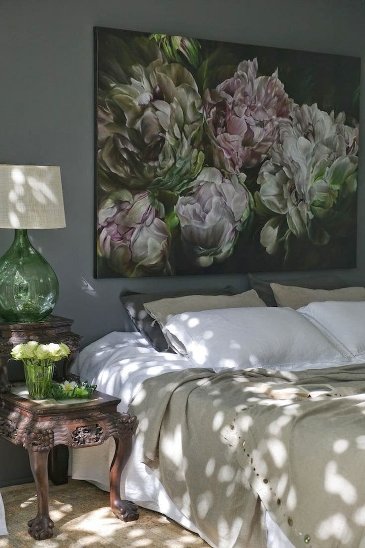 Add a oversized piece of artwork above the bed