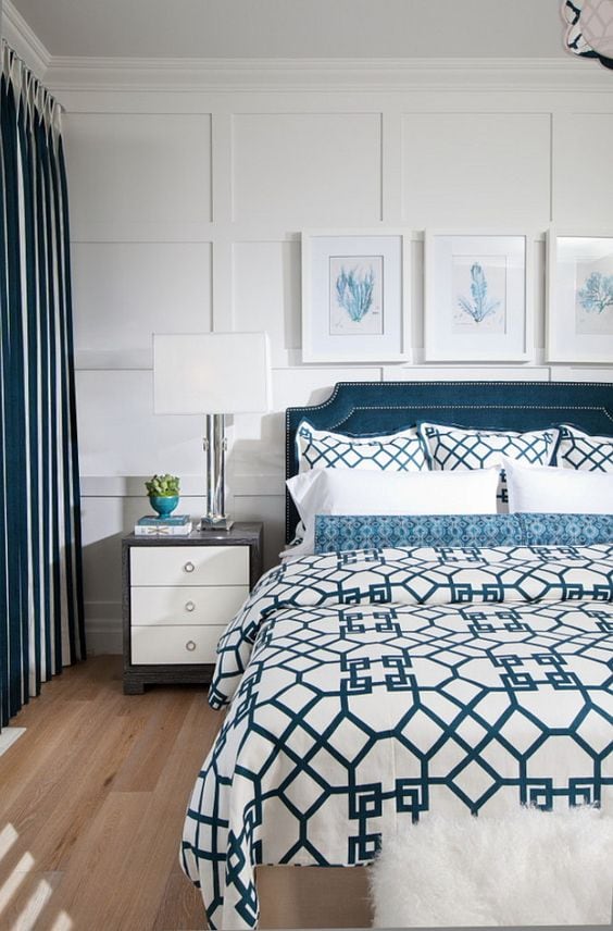 A beautiful board and batten look for behind a bed is stunning! More ideas for decorating above a bed on A Blissful Nest. https://ablissfulnest.com/ 