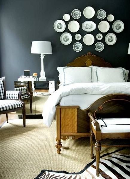 Make a gallery wall out of plates above a bed