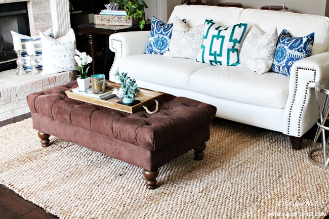 Use natural fiber rugs to add texture to a room 