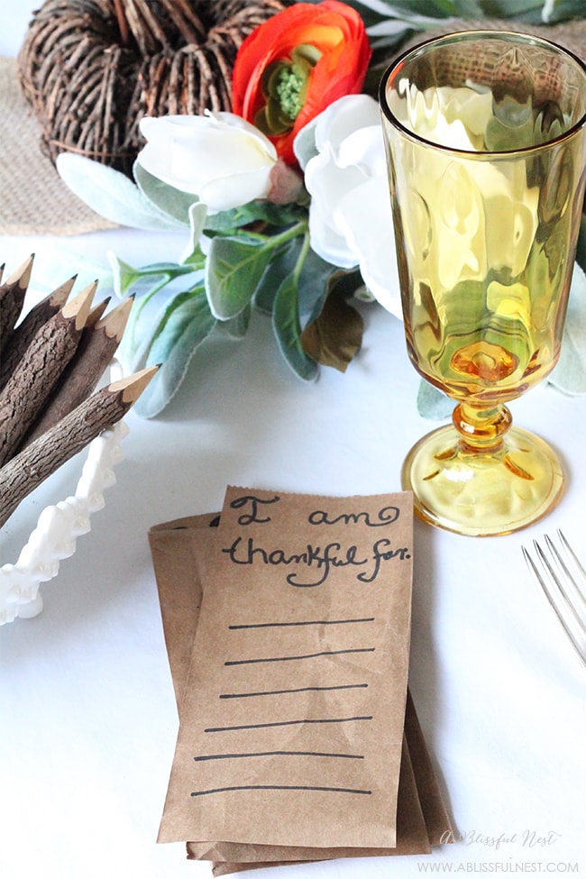Cut up old paper grocery bags to make these Thankful Cards to use at your Thanksgiving table setting. 