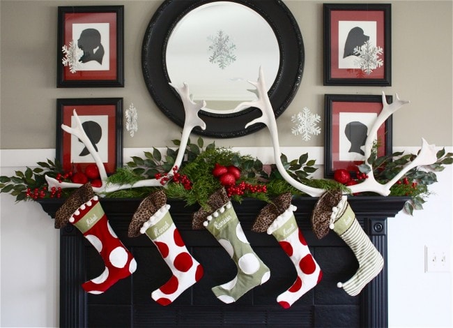 Christmas mantels - polka dot stockings and holly berry garland - Christmas Mantel The Yellow Cape Cod