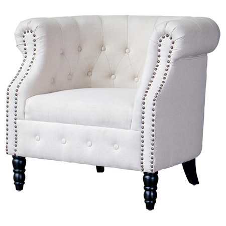 Adore the nailheads on this accent chair! 25 of the best affordable accent chairs on ablissfulnest.com