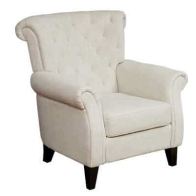 Adore the tufting on this accent chair! 25 of the best affordable accent chairs on ablissfulnest.com