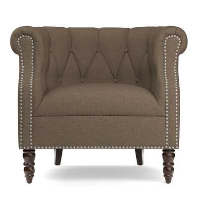 Adore the nailhead on this accent chair! 25 of the best affordable accent chairs on ablissfulnest.com