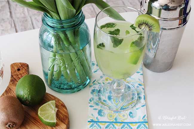 This delicious and refreshing cocktail recipe is perfect for your next gathering with friends. Entertain with this Vodka Kiwi Sour Cocktail Recipe for a unique twist for your dinner party. Recipe details on ablissfulnest.com