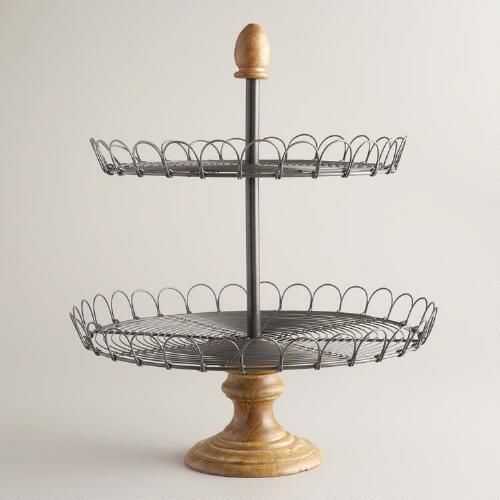 This delicately woven metal 2-tiered stand would be a great addition to a farmhouse tablescape or buffet line.