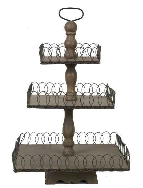 This Creative Co-Op 3-tiered try is antique, but stands out in it's own way. Use for organizing something colorful.