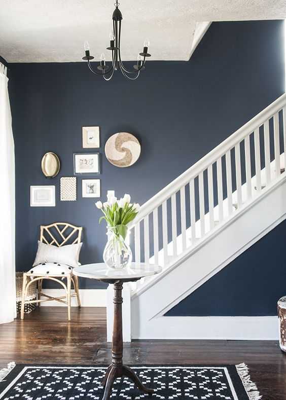 Love the color navy? So do we! Learn how to decorate with navy blue and get our BEST navy paint colors by A Blissful Nest. #navyblue #designtips #decoratewithnavy #navydecor #navylivingroom #blueappliances https://ablissfulnest.com