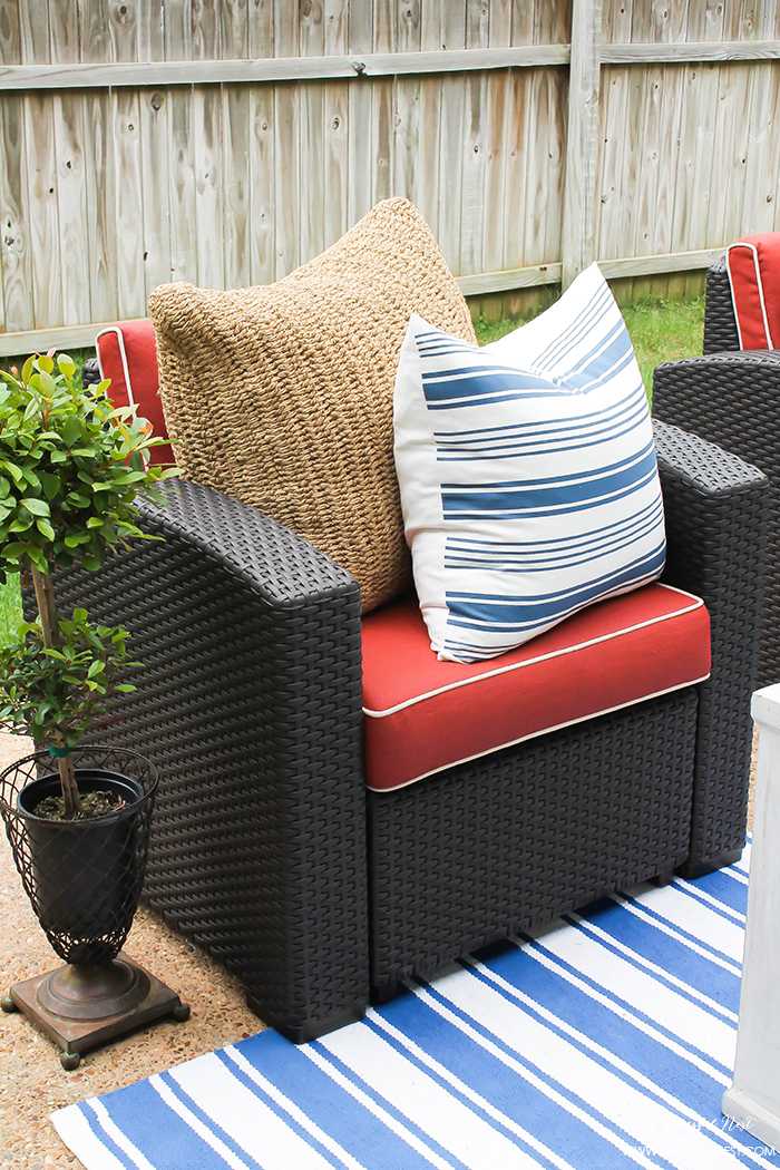 If you've got a small patio then you are not alone. BUT you do not have to sacrifice that designer look because of space issues. We are showing you simple tips to get that designer look with these small patio solutions. Via A Blissful Nest https://ablissfulnest.com #patiodecor #backyarddecor #homedecor #interiordesign #designtips