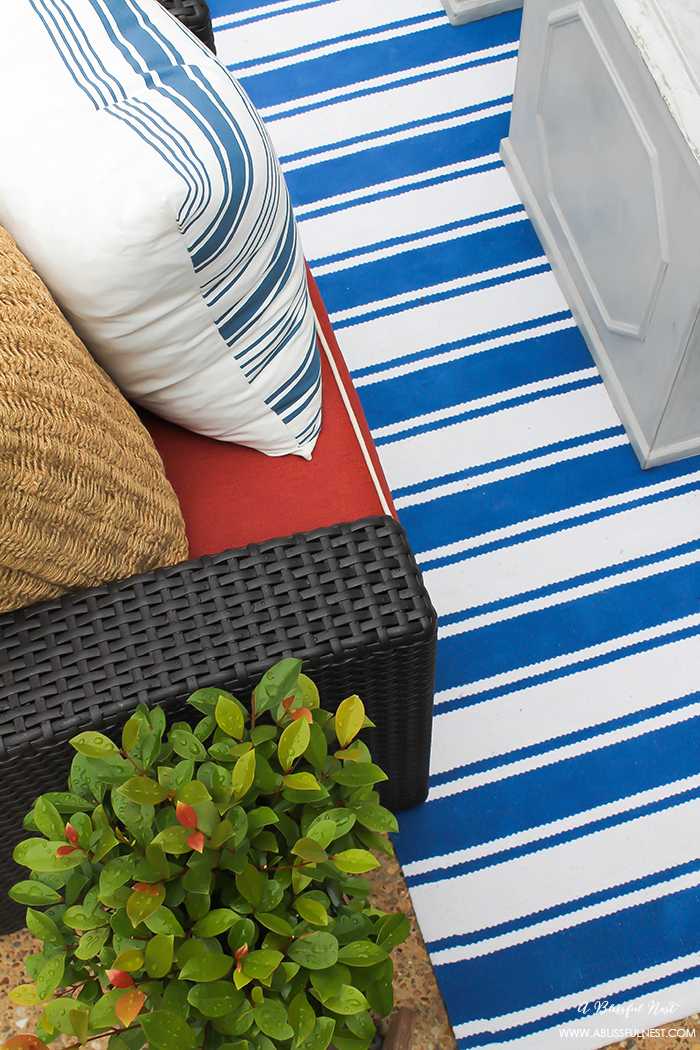 If you've got a small patio then you are not alone. BUT you do not have to sacrifice that designer look because of space issues. We are showing you simple tips to get that designer look with these small patio solutions. Via A Blissful Nest https://ablissfulnest.com #patiodecor #backyarddecor #homedecor #interiordesign #designtips