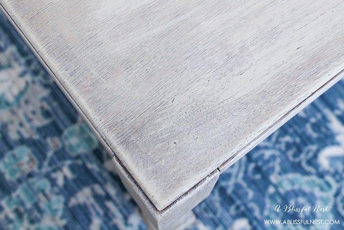 Step three is to add the next layers of paint. Work from darkest to lightest so the lightest layer is on top. You can customize your weathered wood finish with any neutral colors you love!