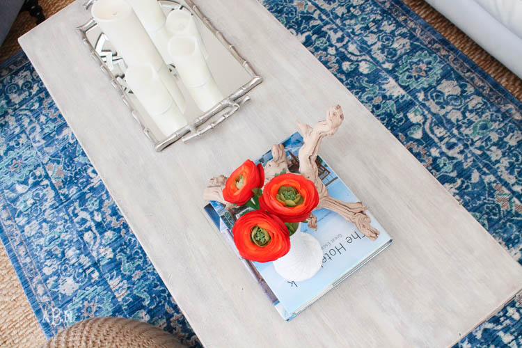 Check out these gorgeous coastal accents in this fall home tour with A Blissful Nest! Love the pops of orange in this home with its neutral pallet. See more at https://ablissfulnest.com/ #fallfrontporch #falldecorating #falldecor #fallhometour