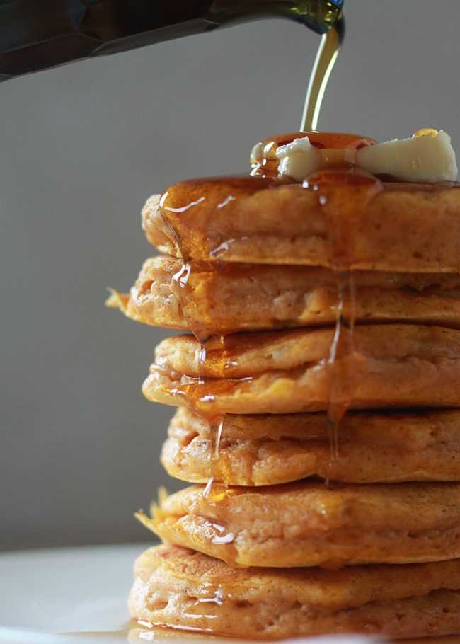 Fluffy Pumpkin Pancakes |25 Pumpkin Recipes that you need to try this fall! From french toast to cupcakes, there is a pumpkin recipe for everyone! https://ablissfulnest.com/ #pumpkin #recipes #fall