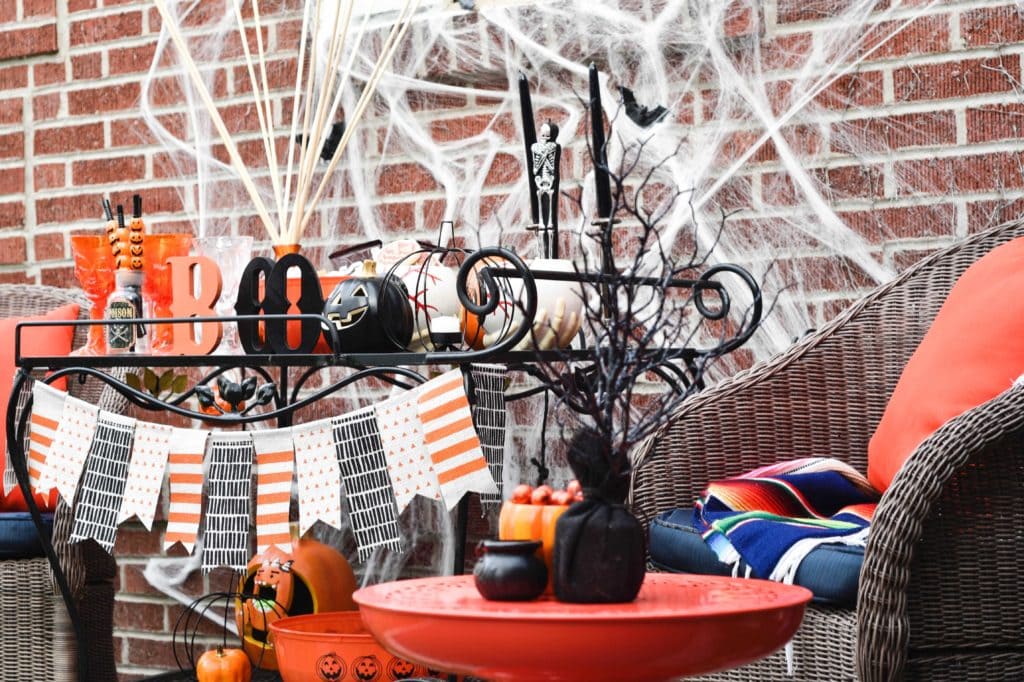 This Halloween Bar Cart isn't only for adults, this adorable cart is kid-friendly and oh so fun! Such a great way to celebrate this fun holiday! https://ablissfulnest.com/ #Halloween #Entertaining #HalloweenParty