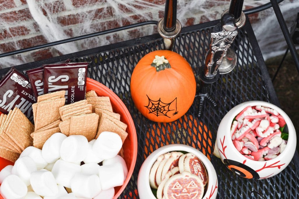 This Halloween Bar Cart isn't only for adults, this adorable cart is kid-friendly and oh so fun! Such a great way to celebrate this fun holiday! https://ablissfulnest.com/ #Halloween #Entertaining #HalloweenParty