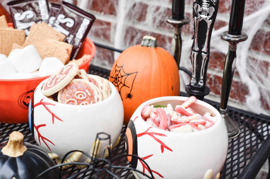 This Halloween Bar Cart isn't only for adults, this adorable cart is kid-friendly and oh so fun! Such a great way to celebrate this fun holiday! https://ablissfulnest.com/ #Halloween #Entertaining #HalloweenParty