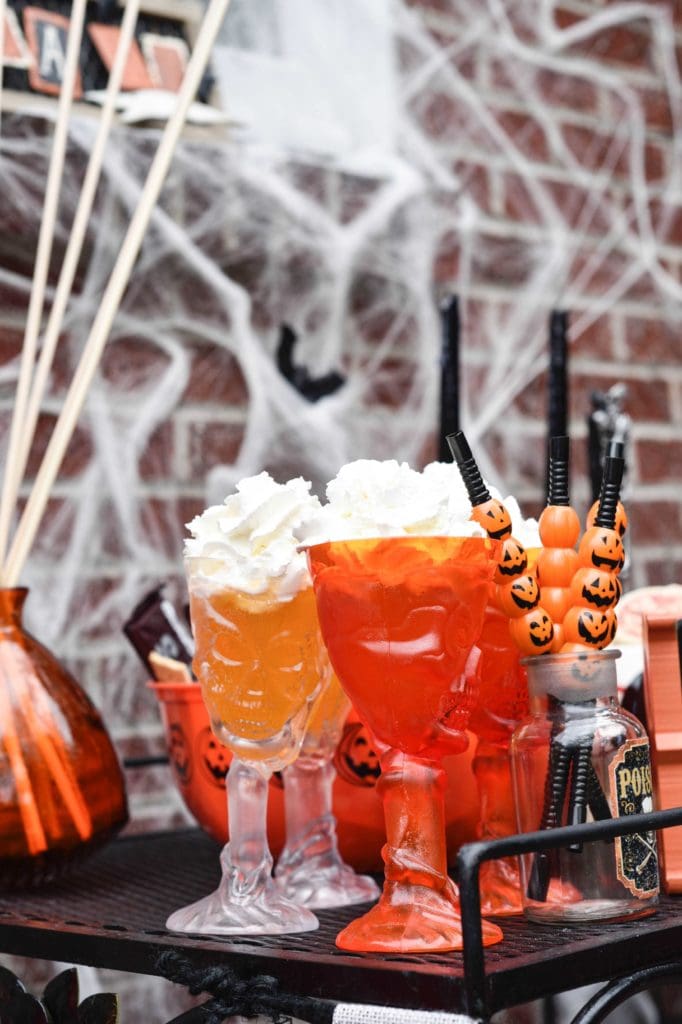 This Halloween Bar Cart isn't only for adults, this adorable cart is kid-friendly and oh so fun! Such a great way to celebrate this fun holiday! https://ablissfulnest.com/ #Halloween #Entertaining #HalloweenParty