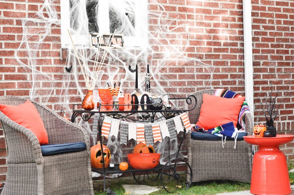 This Halloween Bar Cart isn't only for adults, this adorable cart is kid-friendly and oh so fun! Such a great way to celebrate this fun holiday! https://ablissfulnest.com/ #Halloween #Entertaining #HalloweenParty