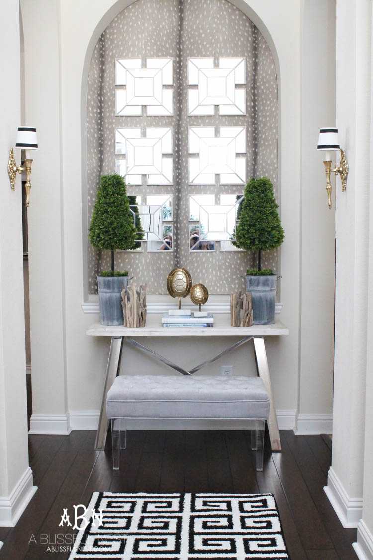 Entryway Decor: Get these tips & hints on getting designer style on a budget with this gorgeous entry makeover! So many great ideas here! See more on https://ablissfulnest.com/ #entrymakeover #designtips