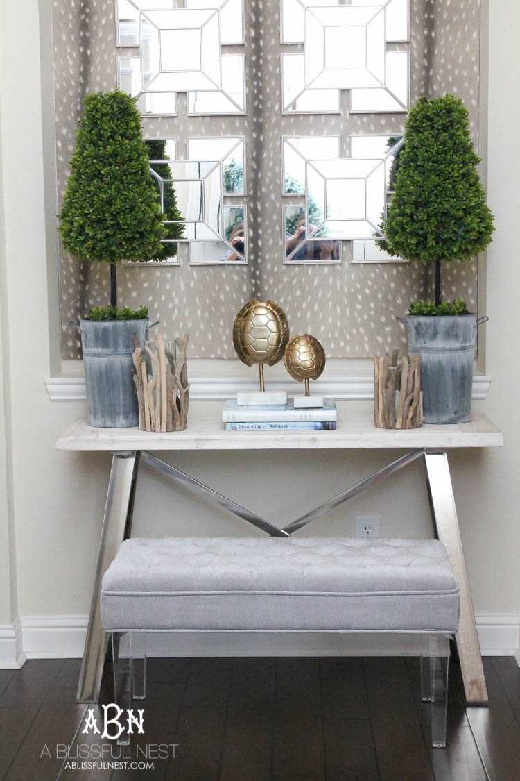 Get these tips & hints on getting designer style on a budget with this gorgeous entry makeover! So many great ideas here! See more on https://ablissfulnest.com/ #entrymakeover #designtips