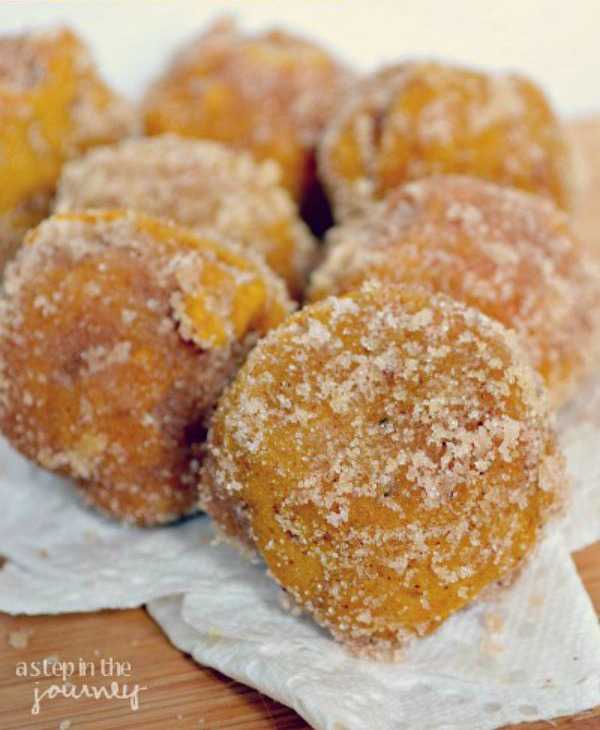 Pumpkin Spice Baked Donut Holes |25 Pumpkin Recipes that you need to try this fall! From french toast to cupcakes, there is a pumpkin recipe for everyone! https://ablissfulnest.com/ #pumpkin #recipes #fall