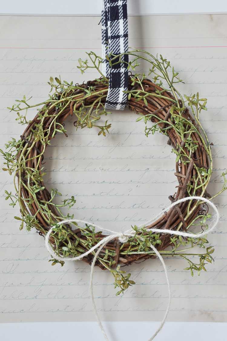 This fall farmhouse mini wreath is a quick and simple project to add a little fall beauty to your homes decor. See more at https://ablissfulnest.com #Fall #FarmhouseDecor #FallWreath