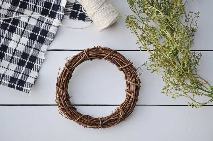 This fall farmhouse mini wreath is a quick and simple project to add a little fall beauty to your homes decor. See more at https://ablissfulnest.com #Fall #FarmhouseDecor #FallWreath