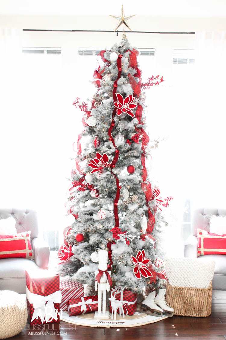 decorated white christmas trees with ribbon