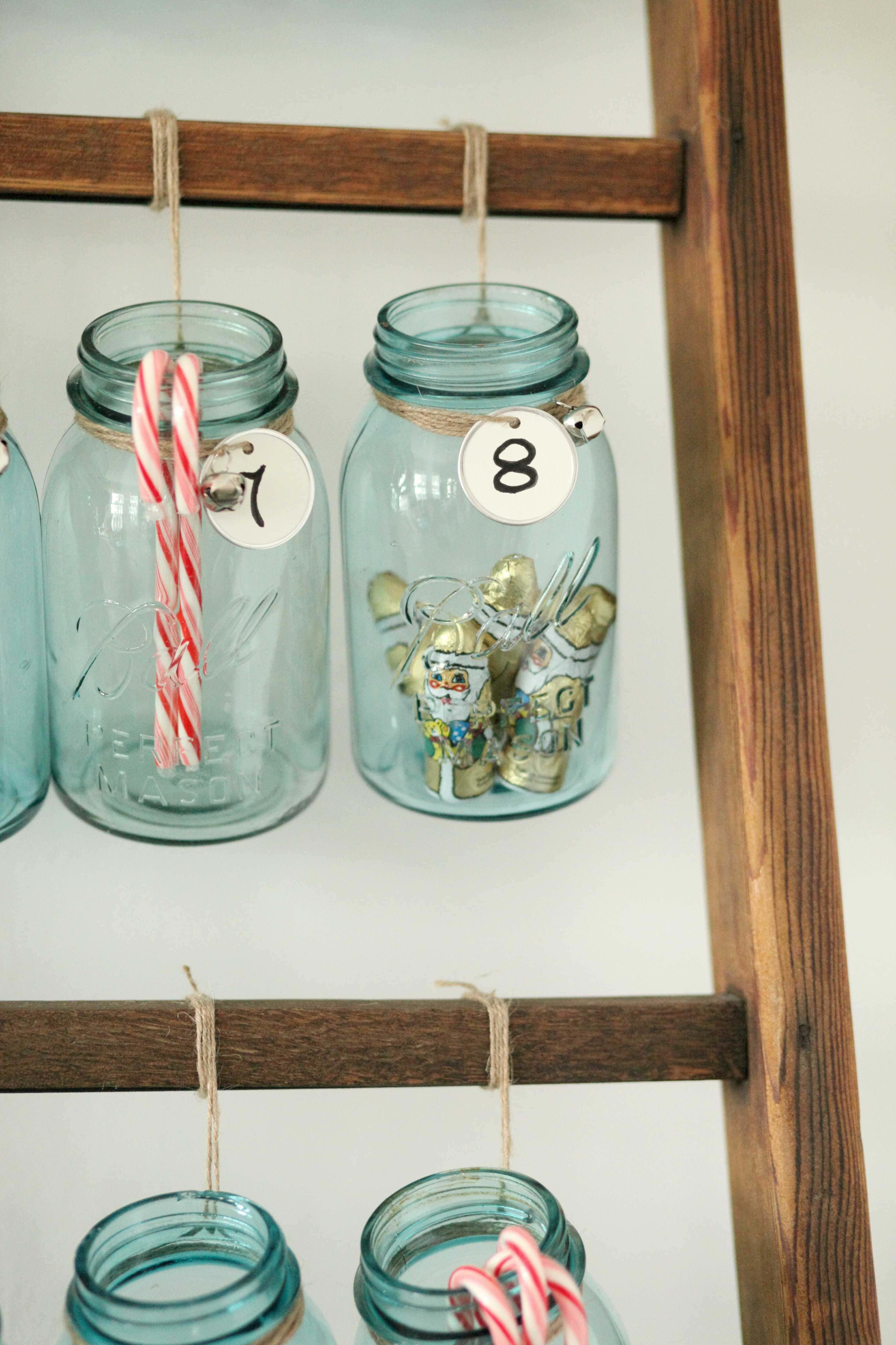 Beautiful Christmas decor using a Vintage Ladder for a Mason Jar Advent Calendar. So festive and fun! See more on https://ablissfulnest.com/ #Christmas #Advent #ChristmasDecor