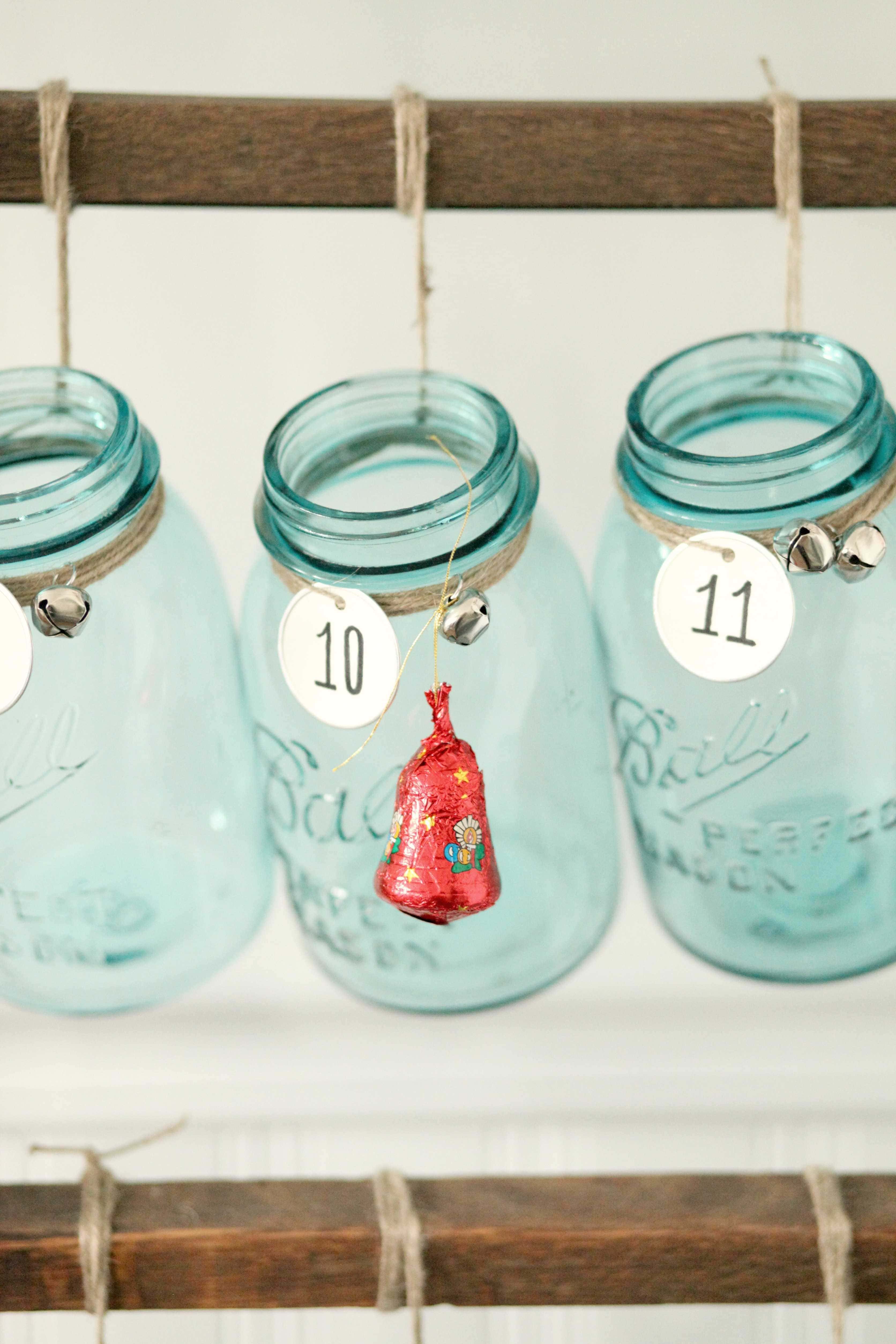 Beautiful Christmas decor using a Vintage Ladder for a Mason Jar Advent Calendar. So festive and fun! See more on https://ablissfulnest.com/ #Christmas #Advent #ChristmasDecor