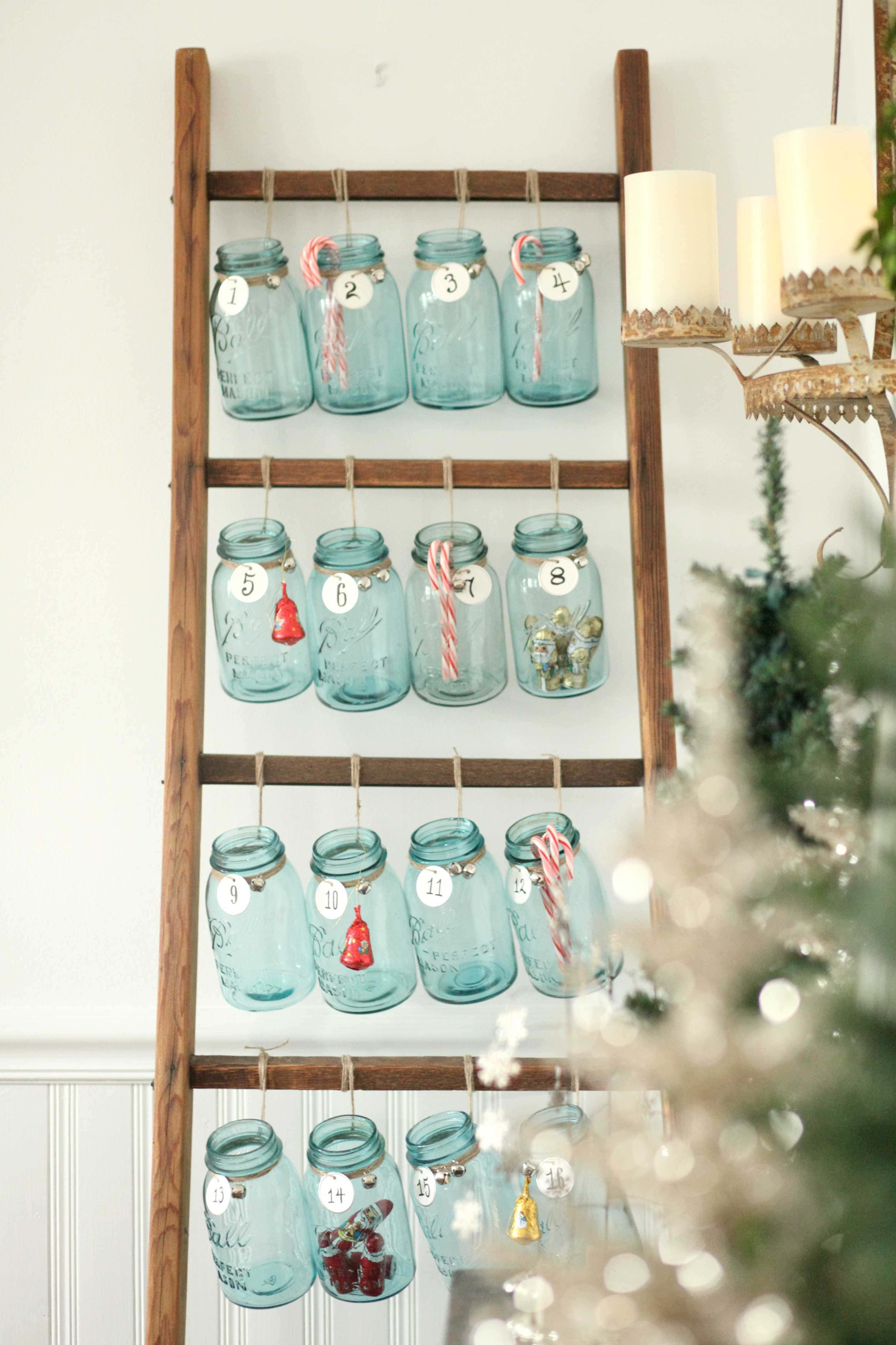 Beautiful Christmas decor using a Vintage Ladder for a Mason Jar Advent Calendar. So festive and fun! See more on https://ablissfulnest.com/ #Christmas #Advent #ChristmasDecor