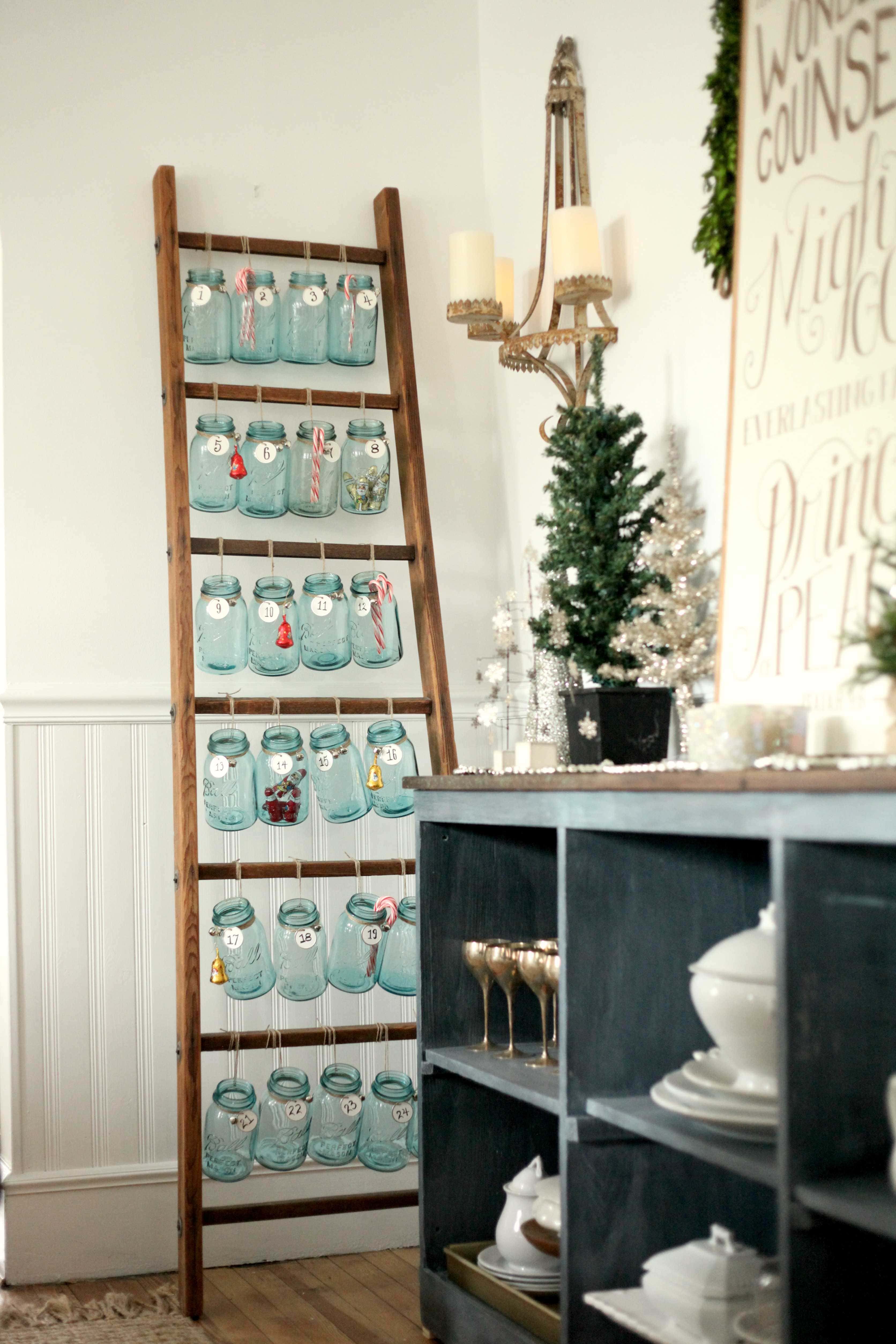 Beautiful Christmas decor using a Vintage Ladder for a Mason Jar Advent Calendar. So festive and fun! See more on https://ablissfulnest.com/ #Christmas #Advent #ChristmasDecor