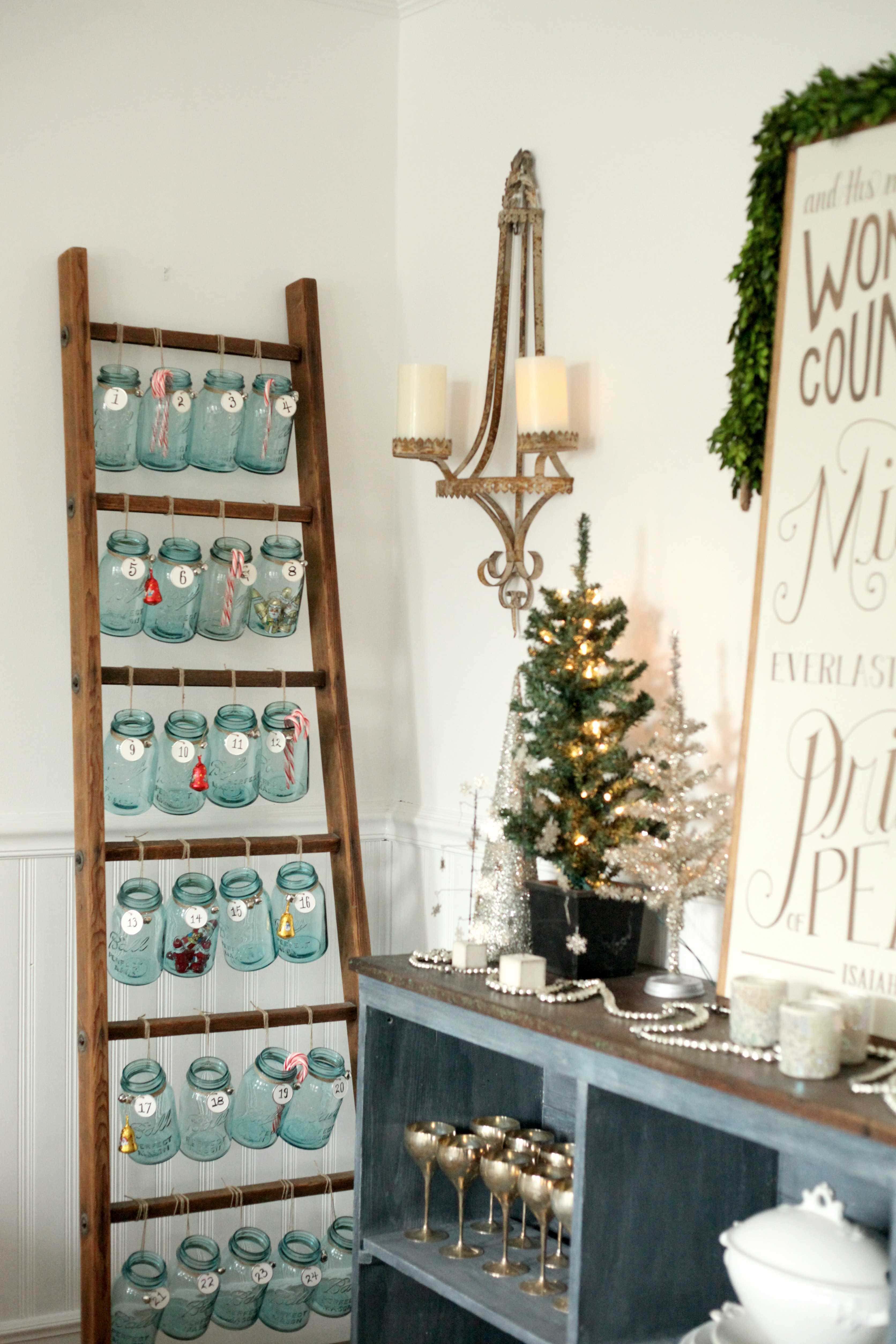 Beautiful Christmas decor using a Vintage Ladder for a Mason Jar Advent Calendar. So festive and fun! See more on https://ablissfulnest.com/ #Christmas #Advent #ChristmasDecor