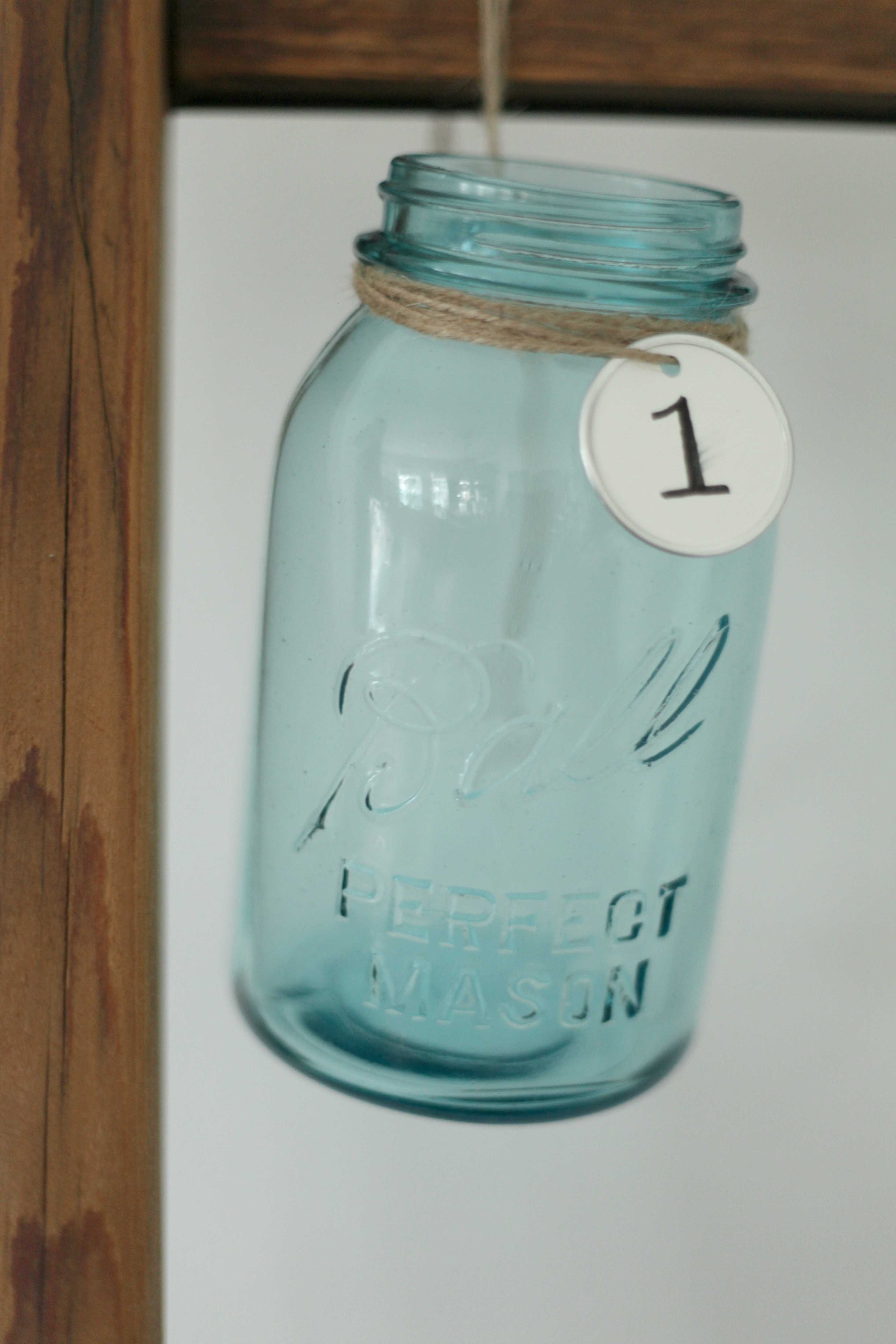 Beautiful Christmas decor using a Vintage Ladder for a Mason Jar Advent Calendar. So festive and fun! See more on https://ablissfulnest.com/ #Christmas #Advent #ChristmasDecor