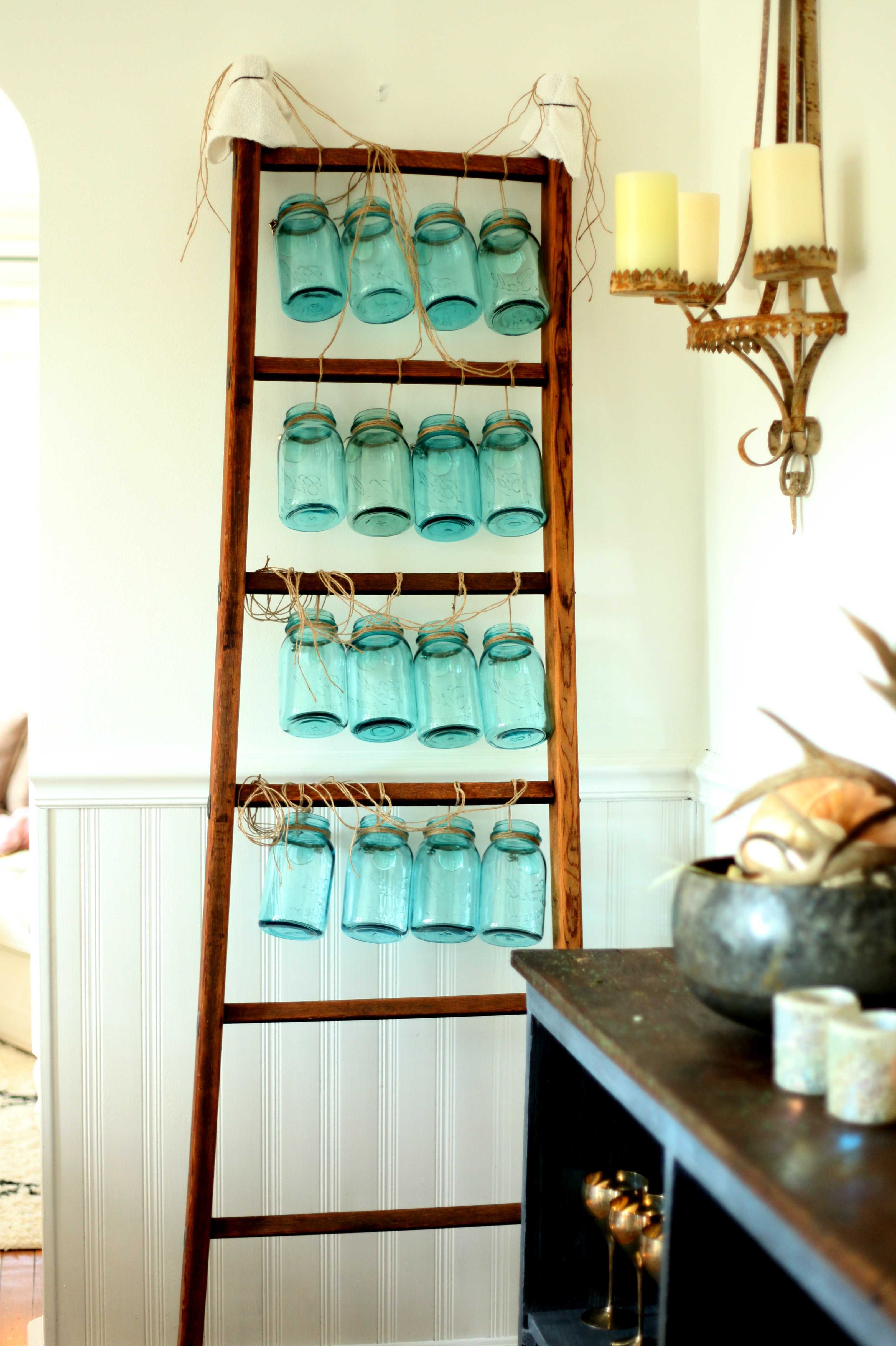 Beautiful Christmas decor using a Vintage Ladder for a Mason Jar Advent Calendar. So festive and fun! See more on https://ablissfulnest.com/ #Christmas #Advent #ChristmasDecor