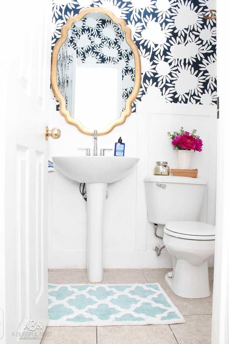 This is such a huge transformation on this bathroom with not many updates. Checkout how with a few simple changes you can get a wow factor bathroom remodel. See more on https://ablissfulnest.com/ #bathroomremodel #bathroommakeover #ad #deltafaucet