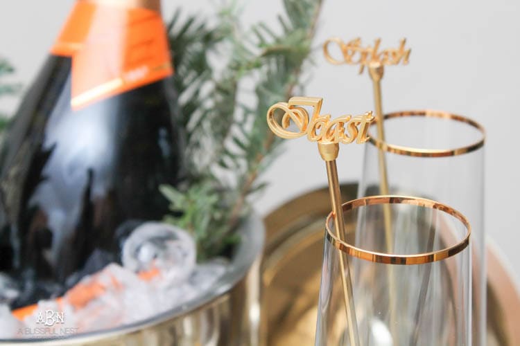 These are such great ideas to transition your Christmas décor into celebrating New Years Eve! Love all the gold and sparkly accents! See more on https://ablissfulnest.com/ #newyearseve #newyearsbarcart #ad #Pier1Love