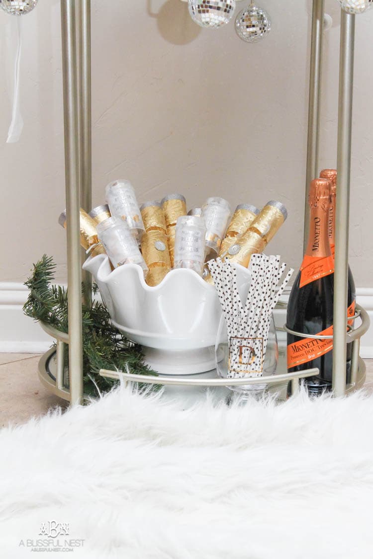 These are such great ideas to transition your Christmas décor into celebrating New Years Eve! Love all the gold and sparkly accents! See more on https://ablissfulnest.com/ #newyearseve #newyearsbarcart #ad #Pier1Love