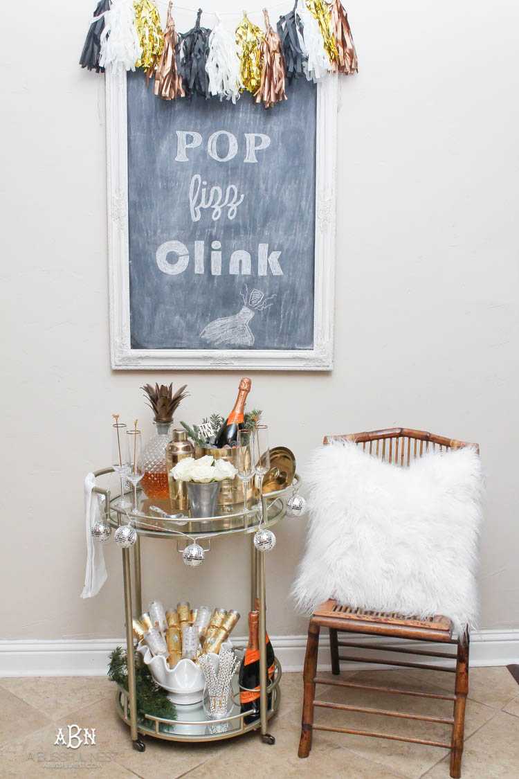 These are such great ideas to transition your Christmas décor into celebrating New Years Eve! Love all the gold and sparkly accents! See more on https://ablissfulnest.com/ #newyearseve #newyearsbarcart #ad #Pier1Love