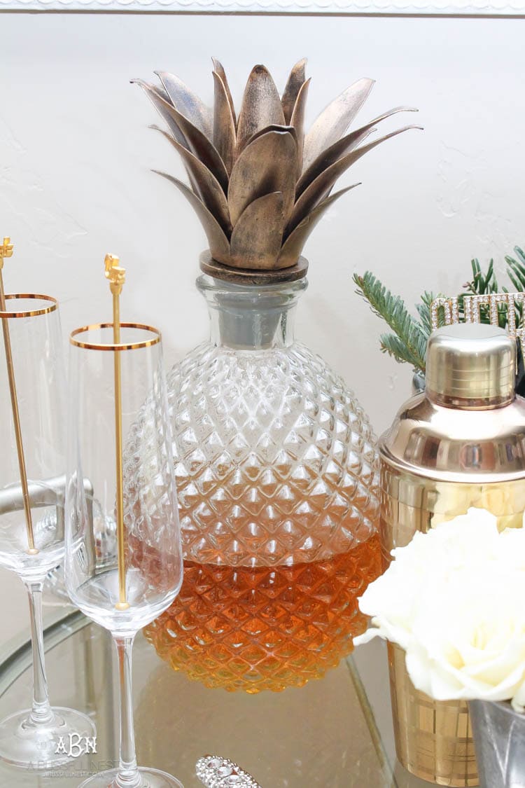 These are such great ideas to transition your Christmas décor into celebrating New Years Eve! Love all the gold and sparkly accents! See more on https://ablissfulnest.com/ #newyearseve #newyearsbarcart #ad #Pier1Love