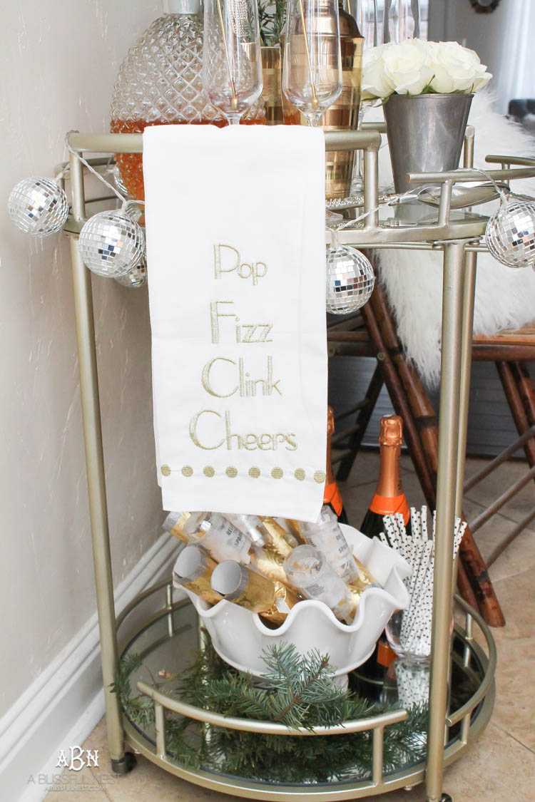 These are such great ideas to transition your Christmas décor into celebrating New Years Eve! Love all the gold and sparkly accents! See more on https://ablissfulnest.com/ #newyearseve #newyearsbarcart #ad #Pier1Love