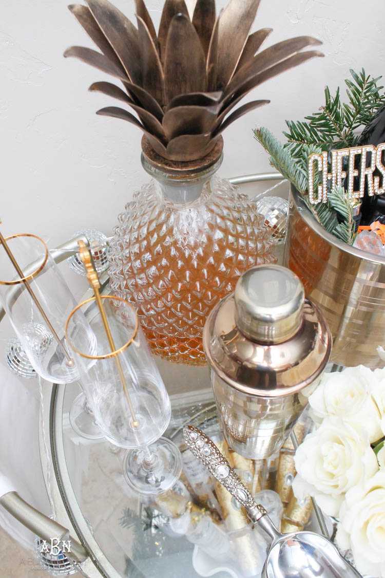 These are such great ideas to transition your Christmas décor into celebrating New Years Eve! Love all the gold and sparkly accents! See more on https://ablissfulnest.com/ #newyearseve #newyearsbarcart #ad #Pier1Love