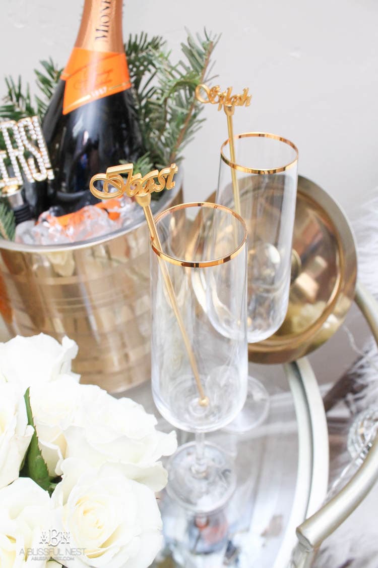 These are such great ideas to transition your Christmas décor into celebrating New Years Eve! Love all the gold and sparkly accents! See more on https://ablissfulnest.com/ #newyearseve #newyearsbarcart #ad #Pier1Love