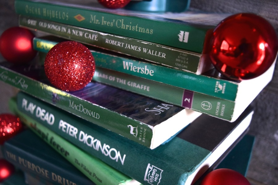 Collect Books for a DIY vintage inspired book Christmas tree. See how to make it at https://ablissfulnest.com/ #Christmas #ChristmasDecor #DecoratingWIthBooks
