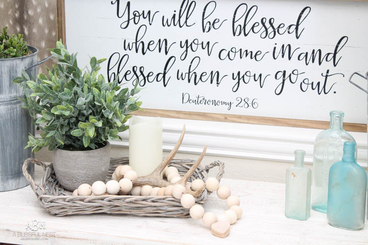 I can not believe how expensive prayer beads normally are! This DIY farmhouse wood prayer bead tutorial is so easy to make and only cost $30. What an amazing and easy DIY Farmhouse decor project! See more on https://ablissfulnest.com/ #farmhousedecor #farmhousestyle