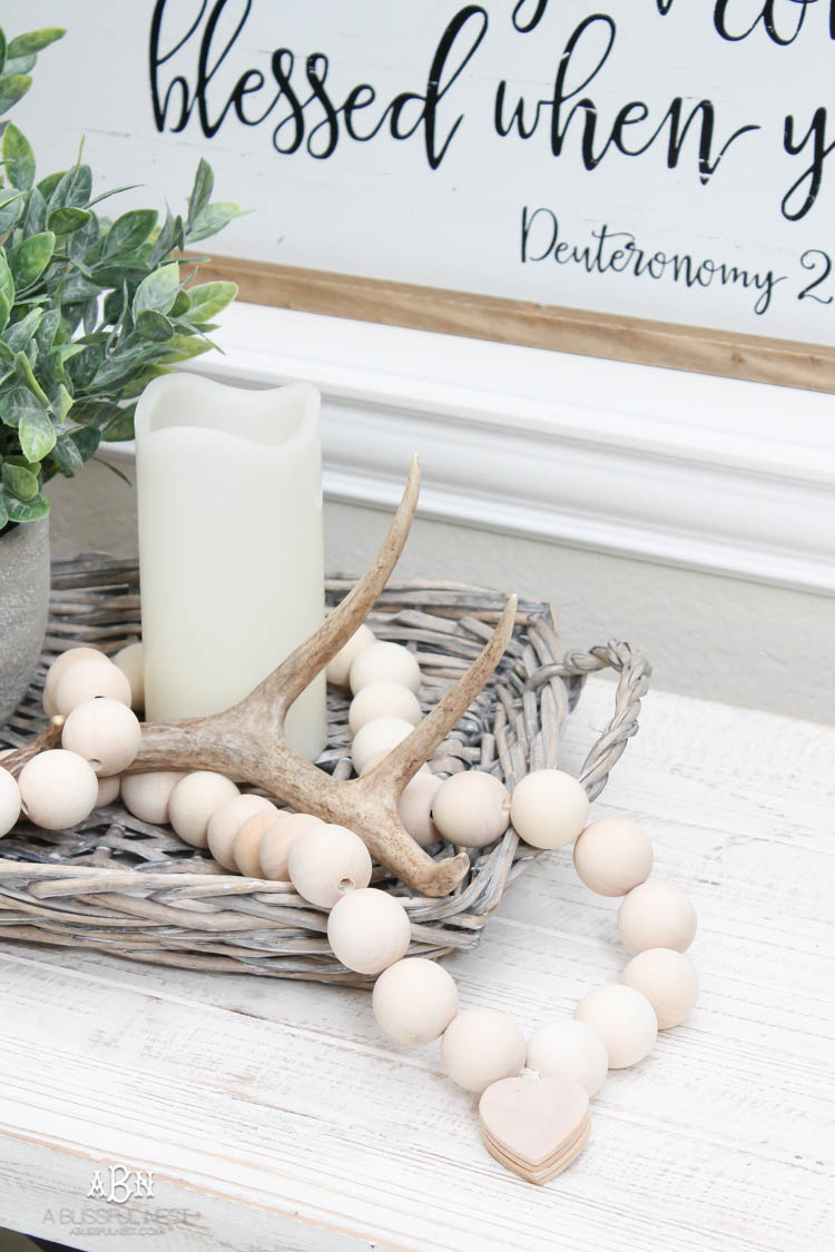 I can not believe how expensive prayer beads normally are! This DIY farmhouse wood prayer beads tutorial is so easy to make and only cost $30. What an amazing and easy DIY Farmhouse decor project! See more on https://ablissfulnest.com/ #farmhousedecor #farmhousestyle