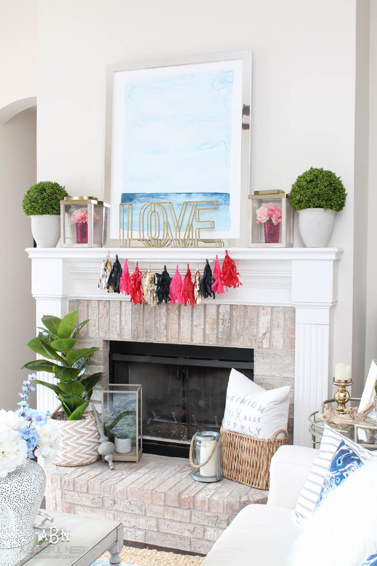 Love this modern look for a Valentine's Day mantle decor! Super easy to recreate with links to all the products. See more on https://ablissfulnest.com/ #valentinesday #valentinesdaydecor